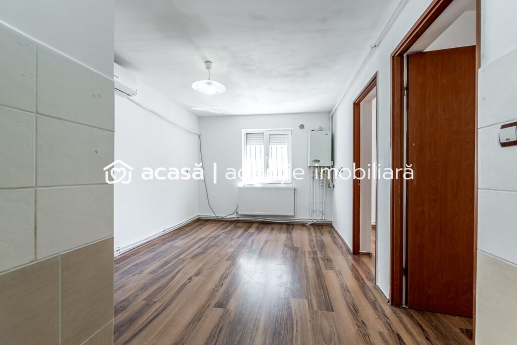 Un cămin practic pentru o familie la început de drum De vânzare Un cămin practic pentru o familie la început de drum în zona Central 3 camere 2 dormitoare Arad 1
